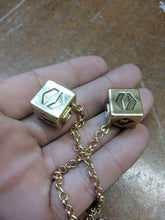 Load image into Gallery viewer, Antiqued Budget Metal Smuggler&#39;s Golden Dice - Scoundrel Gambler Rogue - Gold Plated Metal Dice - Hang in your cockpit -Zinc Alloy